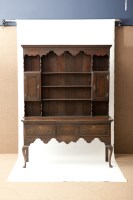 Lot 450 - GEORGE III OAK DRESSER the plate rack with...