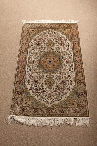 Lot 459 - KASHAN STYLE RUG with ivory bird and flower...