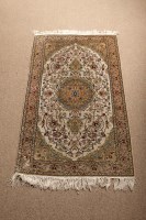 Lot 459 - KASHAN STYLE RUG with ivory bird and flower...