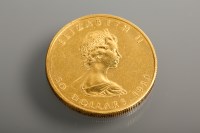 Lot 1005A - GOLD CANADIAN 50 DOLLAR COIN DATED 1980