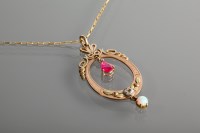 Lot 1125 - EARLY TWENTIETH CENTURY RUBY AND OPAL PENDANT...