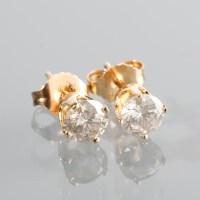 Lot 1137 - PAIR OF DIAMOND SOLITAIRE EARRINGS the...