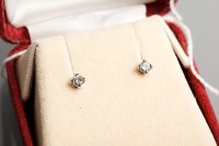 Lot 1170 - PAIR OF DIAMOND STUD EARRINGS each set with a...