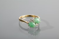 Lot 1179 - JADE AND DIAMOND DRESS RING set with two...