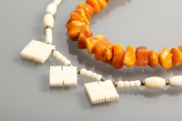 Lot 1201 - EARLY TWENTIETH CENTURY AMBER NECKLACE formed...