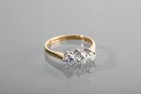 Lot 1205 - DIAMOND THREE STONE RING the brilliant cut...