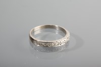 Lot 1208 - DIAMOND HALF ETERNITY RING set with nine...