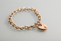 Lot 1213 - NINE CARAT GOLD CURBLINK BRACELET each link...