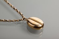 Lot 1214 - OVAL LOCKET with a rope-style detail down the...