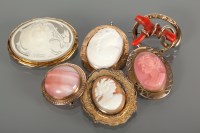 Lot 1240A - THREE GOLD BROOCHES and three other brooches,...