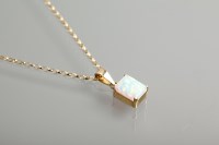 Lot 1245 - CREATED OPAL PENDANT ON CHAIN the rectangular...