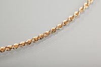 Lot 1251 - NINE CARAT GOLD ROPELINK CHAIN NECKLACE 57cm...