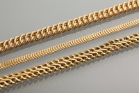 Lot 1254 - THREE NINE CARAT GOLD CHAIN BRACELETS 22.6g...