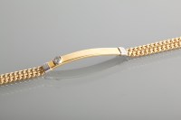 Lot 1258 - EIGHTEEN CARAT GOLD DIAMOND SET BRACELET...