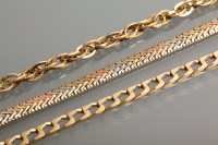 Lot 1261 - THREE NINE CARAT GOLD CHAIN BRACELETS 20.1g...