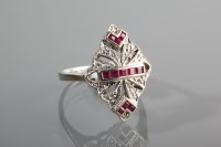 Lot 1278 - RUBY AND DIAMOND DRESS RING the pierced...