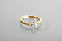 Lot 1290 - DIAMOND SOLITAIRE RING the brilliant cut stone...