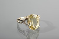 Lot 1340 - CITRINE AND DIAMOND DRESS RING the central...