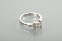 Lot 1358 - DIAMOND CLUSTER RING the square shaped bezel...