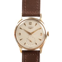 Lot 981 - GENTLEMAN'S NINE CARAT GOLD LONGINES WRIST...