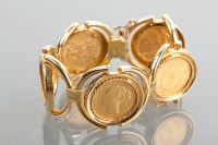 Lot 1048 - GOLD SOVEREIGN BRACELET with five sovereigns...