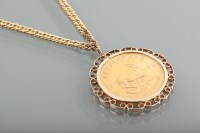 Lot 1063 - KRUGERRAND DATED 1974 mounted in a nine carat...