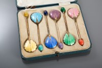 Lot 19 - SET OF SIX SILVER AND ENAMEL TEASPOONS in...