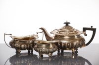 Lot 32 - GEORGE V SILVER THREE PIECE TEA SERVICE of...