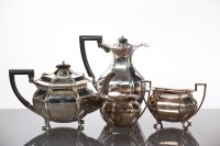 Lot 45 - SILVER FOUR PIECE TEA SERVICE of bombe...