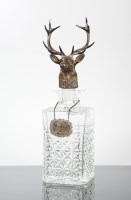 Lot 59 - WHISKY INTEREST: A SILVER GLENFIDDICH STAG'S...