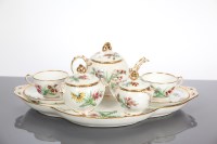 Lot 107 - EDWARDIAN ENGLISH EIGHT PIECE GILT PORCELAIN...