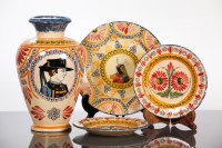 Lot 111 - QUIMPER VASE AND THREE PLATES the vase and one...