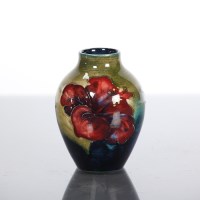 Lot 126 - SMALL MOORCROFT ORCHID PATTERN VASE painted...
