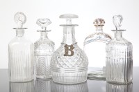 Lot 179 - FIVE VICTORIAN GLASS DECANTERS AND A SILVER...