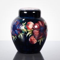 Lot 181 - MOORCROFT GINGER JAR WITH COVER painted with...