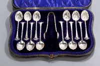 Lot 74 - TWELVE SILVER SUGAR SPOONS AND TONGS maker...