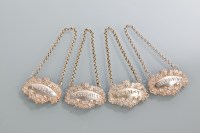 Lot 105 - FOUR PRESSED SILVER DECANTER LABELS titled...