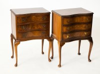 Lot 204 - PAIR OF SERPENTINE WALNUT BEDSIDE CHESTS with...