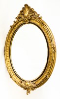 Lot 226 - MODERN OVAL GILT WALL MIRROR with acanthus...