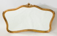 Lot 227 - MODERN GILT FRAMED CATOUCHE SHAPED WALL MIRROR...