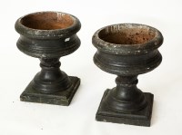 Lot 234 - PAIR OF BLACK PAINTED STONEWARE GARDEN URNS...