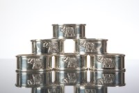 Lot 237 - SET OF SIX OVAL SILVER NAPKIN RINGS each cast...