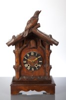 Lot 277 - EARLY 20TH CENTURY CUCKOO CLOCK with a carved...