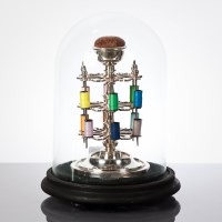 Lot 352 - SILVER PLATED BOBBIN STAND UNDER GLASS DOME...