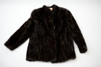 Lot 398 - MINK FUR COAT in dark brown, approximate size...