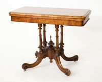 Lot 441 - VICTORIAN FIGURED WALNUT CARD TABLE on four...