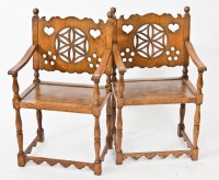 Lot 341 - PAIR OF ARTS AND CRAFTS OAK ARMCHAIRS the...