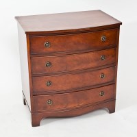 Lot 394 - MODERN MAHOGANY BOWFRONT CHEST with four long...