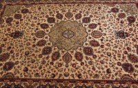 Lot 436 - TABRIZ STYLE RUG with ivory field and wide...