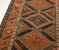 Lot 484 - HAMADAN RUG with single row of lozenges within...